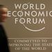 MUCH AT STAKE: Men walk past the official logo of the World Economic Forum inside the Congress Hall in the Swiss Alpine resort of Davos. Picture: REUTERS