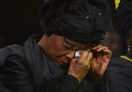 Nelson Mandela’s widow Graca Machel wipes her tears during the funeral ceremony in Qunu on Sunday. Picture: REUTERS