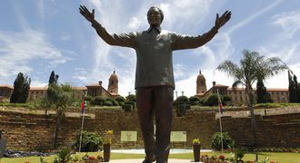 A bronze statue of former president Nelson Mandela is unveiled as part of the Day of Reconciliation Celebrations at the Union Buildings in Pretoria on Monday. Picture: REUTERS