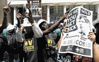 SOLIDARITY: Hundreds of people, some former mine workers, at the Justice for Miners march in Joburg last year. Picture: THE TIMES
