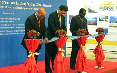 President Jacob Zuma, Chinese President Xi Jinping and Zimbabwean President Robert Mugabe cut the ribbon to mark the opening of an exhibition in Johannesburg. Picture: KOPANO TLAPE