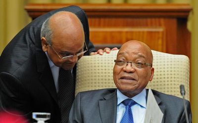 TOUGH TALK: Minister of Finance Pravin Gordhan speaks to President Jacob Zuma at the meeting held at the Union Buildings in Pretoria on Wednesday. Picture: GCIS