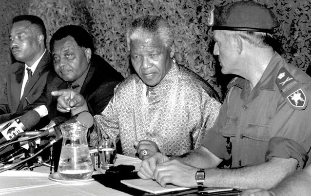 PEACE TALK: Nelson Mandela in discussions in the early 1990s after his release from prison. Picture: GETTY IMAGES