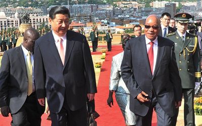 RED CARPET: President Jacob Zuma, right, with the President of the People's Republic of China, Xi Jinping, left, during a Chinese state visit at the Union Buildings in Pretoria on Tuesday.  Picture: GCIS