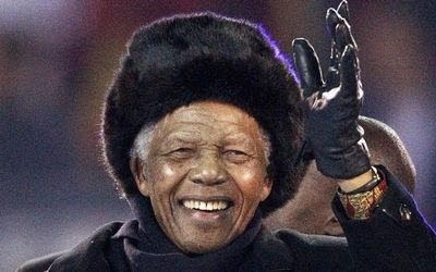 Former president Nelson Mandela waves to the crowd at Soccer City stadium during the closing ceremony for the 2010 World Cup in Johannesburg in this July 11 2010 file photo. Picture: REUTERS