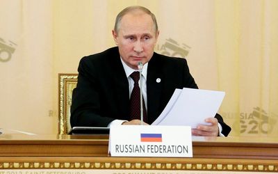 Russian President Vladimir Putin attends the first working session of the G20 Summit in Constantine Palace in Strelna near St. Petersburg, Russia, on Thursday.  Picture: REUTERS