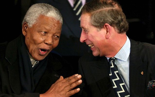 Britain's Prince Charles, right, shares a light moment with Nelson Mandela during a show at the Amsterdam arena, in this February 1, 2002 file photo.  Picture: REUTERS