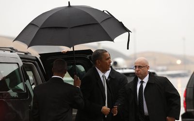 US President Barack Obama steps from his limo to board Air Force One as he  departs Joint Base Andrews  in Washington en route to Johannesburg on Monday. Picture: REUTERS