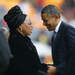 US President Barack Obama pays his respect to former SA president Nelson Mandela’s widow Graça Machel after his speech at the memorial service at FNB Stadium in Johannesburg on Tuesday. Picture: REUTERS 