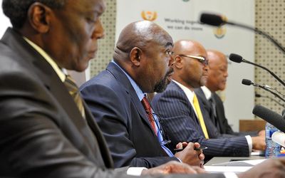 (Left to right) Ministers of the Justice Crime Prevention and Security Cluster State Security Minister Siyabonga Cwele, Public Works Minister Thulas Nxesi, Police Minister Nathi Mthethwa and Justice and Constitutional Development Minister Jeff Radebe brief the media on the security upgrade at President Jacob Zuma's Nkandla residence on Thursday.  Picture: GCIS