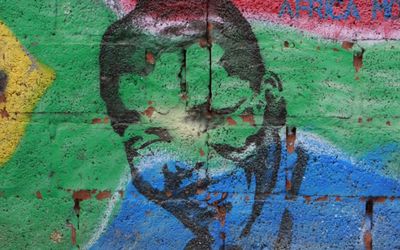 A portrait of former president Nelson Mandela painted on a wall in Johannesburg in July 2012. Picture: GALLO IMAGES/THE TIMES