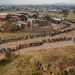 Voters queue at the Rakgatla High School voting station in Marikana, where residents reported waiting on line for more than four hours. Photo: AFP/Skyler 