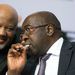 Finance Minister Nhlanhla Nene, right, has a word with his deputy Mcebisi Jonas at a media briefing ahead of the 2015 budget speech on Wednesday.  Picture: TREVOR SAMSON 