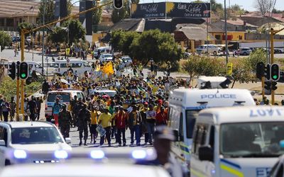 African National Congress (ANC) supporters march against Eskom and power cuts on Thursday in Soweto. Picture: AFP PHOTO/MUJAHID SAFODIEN