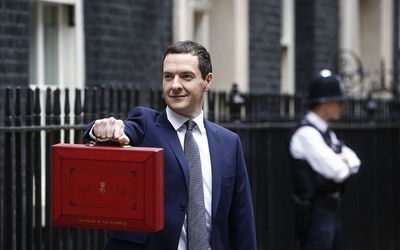 Chancellor of the Exchequer George Osborne holds the dispatch box containing the first budget by a Tory-majority government in almost two decades at  11 Downing Street in London, the UK, on Wednesday. Picture: BLOOMBERG/SIMON DAWSON