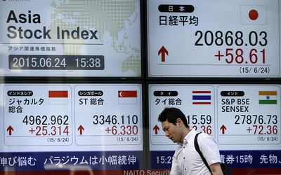 The writers argue that rating the world in terms of developed and emerging markets, among other things, is to hold an erroneous view in tracking the movements of global capital. Picture: REUTERS/ISSEI KATO