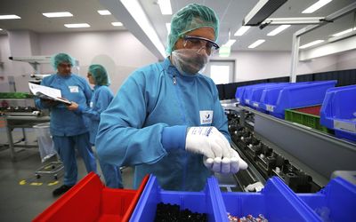 An employee assembles an injection-pen for the diabetes drug Lyxumia at a manufacturing site of French drug maker Sanofi in Frankfurt, German. Picture: REUTERS/RALPH ORLOWSKI