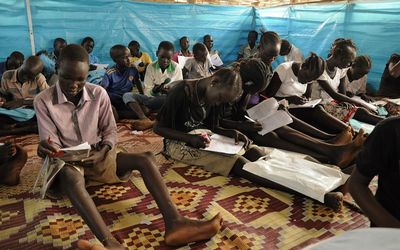 Once the site of makeshift schools such as this, Juba is starting to rebuild itself — but South Sudan still faces problems such as poverty and corruption. Picture: REUTERS/JOK SOLOMON