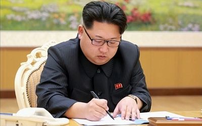 North Korean television shows leader Kim Jong-Un signing a document allowing for a hydrogen bomb test, in Pyongyang.  Picture: AFP PHOTO