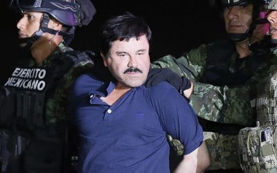 Fugitive Mexican drug lord Joaquin 'El Chapo' Guzman is escorted by the authorities to a Mexican Army helicopter in Los Mochis, Sinaloa, Mexico, 08 January 2016. Picture: EPA/JOSE MENDEZ