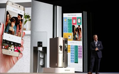 John Herrington, senior vice-president of Samsung Electronics America, unveils the Family Hub refrigerator during an event at the Consumer Electronics Show in Las Vegas last week. Picture: BLOOMBERG/PATRICK T FALLON