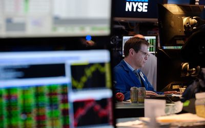 A trader works on the floor of the New York Stock Exchange. Picture: AFP