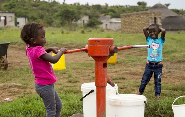 Children pump water at the last tap with running water in drought-stricken Masotsheni, north of Durban, last month. Scientists are flying into the source of El Niño, causing the drought, to collect data. Picture: REUTERS