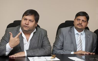 PROTECTION:  Ajay, left, and Atul Gupta and other members of the family turned to the high court for an urgent order to stop the Economic Freedom Fighters from inciting violence against them and staff in their businesses. The Guptas said threatening calls were received earlier this week. Picture: MARTIN RHODES