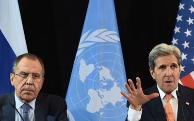 US Secretary of States John Kerry (R) gestures beside of Russian Foreign Minister Sergei Lavrov (L) during a news conference after the International Syria Support Group (ISSG) meeting in Munich, southern Germany, on Friday. Picture: AFP / CHRISTOF STACHE