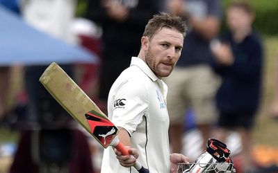 Brendon McCullum walks from the field for the last time for New Zealand after being caught during day three of the second cricket Test match between New Zealand and Australia at the Hagley Park in Christchurch on Monday. Picture: AFP PHOTO/MARTY MELVILLE 