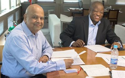 Finance Minister Pravin Gordhan and National Treasury Director-General Lungisa Fuzile at a pre-budget meeting on Tuesday. Picture: TREVOR SAMSON 