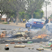North West University students throw stones at police officers during a protest in October last year.  Picture: SOWETAN