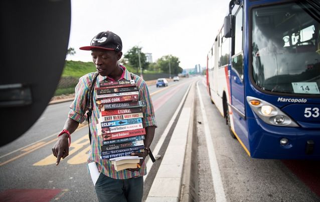 Philani Dladla  stands on the side of Empire Road in Braamfontein, next to the University of the Witwatersrand, where he previously sold books to motorists. Picture: DANIEL BORN