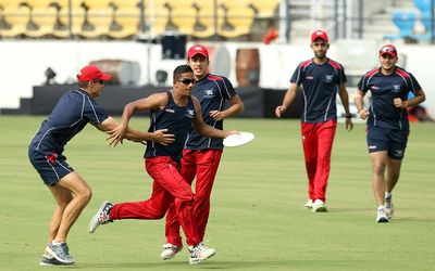 Hong Kong cricketers take part in a training session ahead of the forthcoming Cricket World Cup T20 tournament at the Vidarbha Cricket Association Stadium in Nagpur on March 7, 2016. Picture: AFP/STRINGER