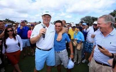 Rickie Fowler of the US is embraced by Ernie Els after he wins the $1m Hole-In-One Challenge sponsored by SAP and Ketel One Vodka for the Els for Autism Foundation's in Florida, the US, on Monday. Picture: GETTY IMAGES/DAVID CANNON