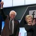 Democratic US presidential candidates Senator Bernie Sanders and Hillary Clinton wave before the start of the Univision News and Washington Post Democratic US presidential candidates debate in Kendall, Florida. Picture: REUTERS