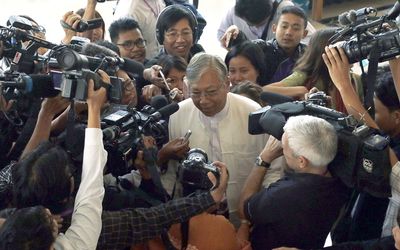 TRUSTED:  Htin Kyaw, who was nominated yesterday by Aung San Suu Kyi’s party as president of Myanmar, talks to the media on February 1. Picture: AFP PHOTO