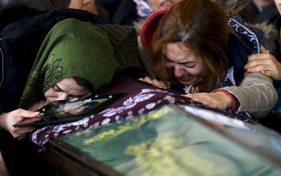 Women cry over the coffin of a car bombing victim during a commemoration ceremony in a mosque in Ankara, Turkey, on Monday.  Picture: REUTERS/UMIT BEKTAS