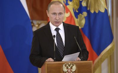 MISSION ACCOMPLISHED: Russian President Vladimir Putin speaks at a ceremony in Moscow on Thursday to present awards to service personnel who distinguished themselves during their missions in Syria. Picture: REUTERS/ALEXEI NIKOLSKY