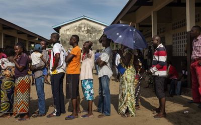 Congolese voters queue outside a polling station during presidential elections in Brazzaville, on March 20, 2016. Picture: AFP/EDUARDO SOTERAS