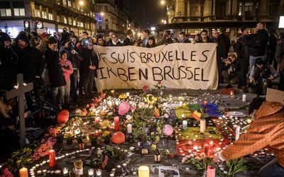 People gather at Bourse Square to pay tribute to the victims of the terrorist attacks in Brussels, Belgium, on Tuesday. Picture: EPA/CHRISTOPHE PETIT TESSON