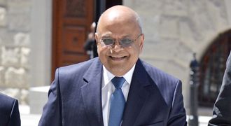 Finance Minister Pravin Gordhan leaves a media briefing in Cape Town on Thursday ahead of presenting the medium-term budget policy statement. Picture: TREVOR SAMSON
