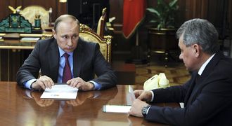 Russian President Vladimir Putin holds talks with Defence Minister Sergei Shoigu at the Kremlin in Moscow, Russia, on Monday. Picture: REUTERS/MIKHAIL KLIMENTYEV