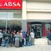 People queue at an Absa ATM in Oxford street, East London, to get access to their social grant money.  Picture: DAILY DISPATCH 