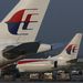Malaysia Airlines planes sit on the tarmac at Kuala Lumpur International Airport. Picture: REUTERS