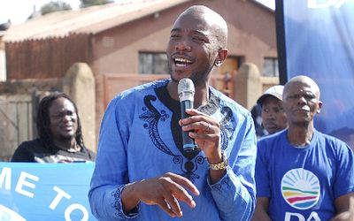 Democratic Alliance leader Mmusi Maimane speaks to residents in Jabavu, Soweto, on Monday as he campaigns for next year’s election. Picture: PUXLEY MAKGATHO