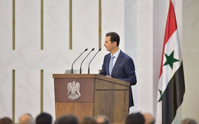 Syrian President Bashar al-Assad addresses the media and members of public organisations and professional associations in Damascus, Syria, on Sunday. Picture: REUTERS/SANA