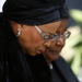 GRIEVING: Former president Nelson Mandela’s widow, Graça Machel, at the official memorial service at FNB Stadium in Johannesburg on Tuesday. Picture: REUTERS