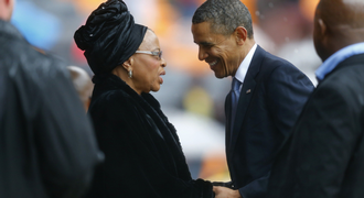 US President Barack Obama pays his respect to former SA president Nelson Mandela’s widow Graça Machel after his speech at the memorial service at FNB Stadium in Johannesburg on Tuesday. Picture: REUTERS 