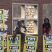 Children play at a building in Bekkersdal as voting takes place on Wednesday.  Picture: PUXLEY MAKGATHO